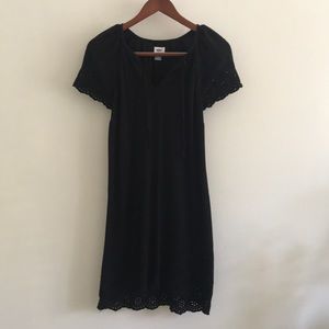 Black dress with decorative eyelet sleeves